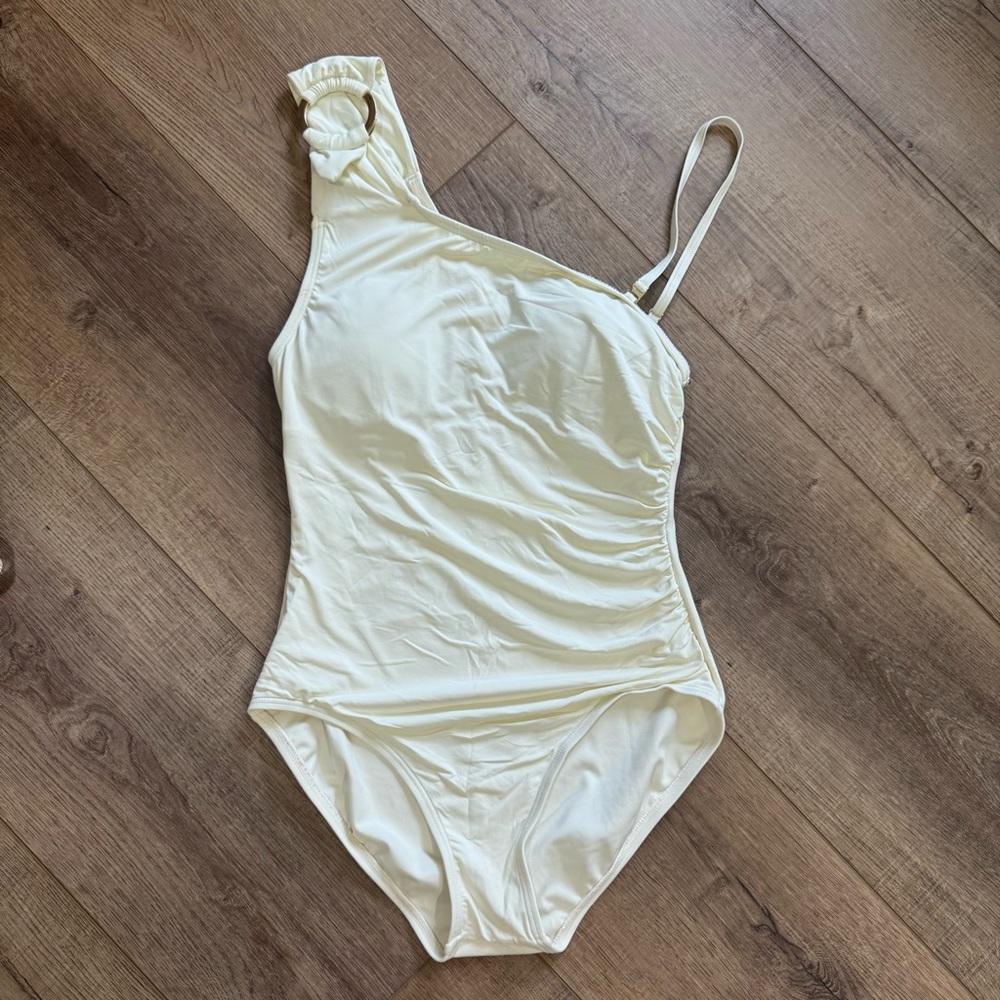 Kate Spade cream one shoulder swim suit with removable strap size M.